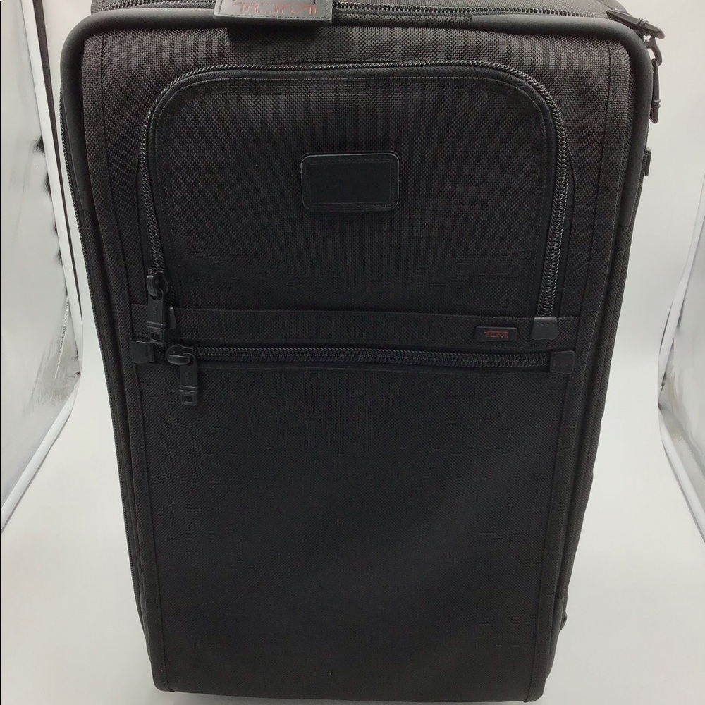 TUMI roll on luggage BRAND NEW NEVER USED